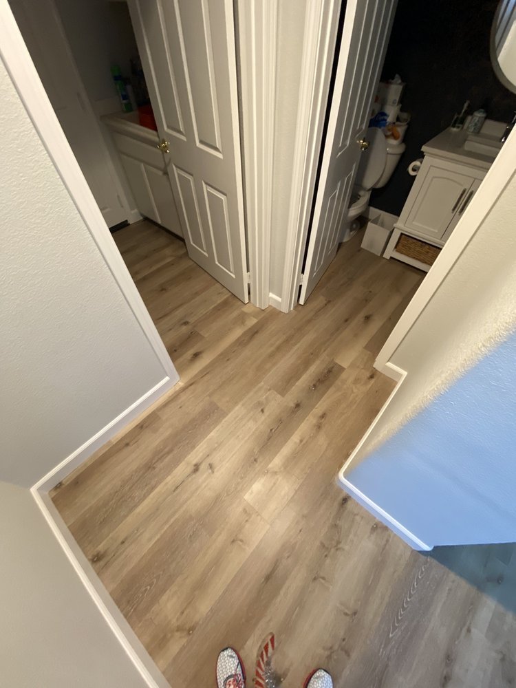 hallway with hardwood flooring