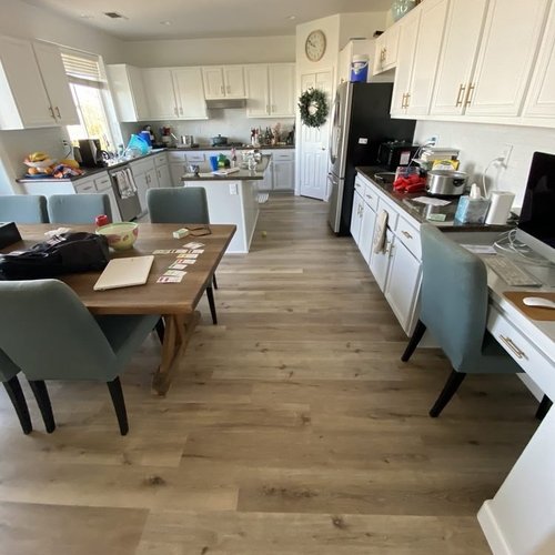 open plan living space with hardwood flooring